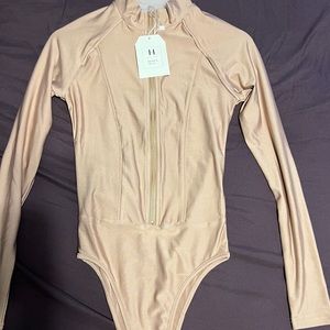 Hidden Bran zip up bodysuit